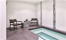 After a treatment at the spa, relax and soak in the spa's whirlpool.